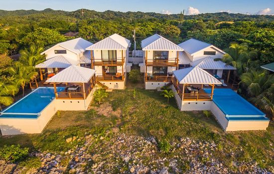 Even with a full house of 24 guests, the aerial layout shows multiple distinct zones—like the private balconies, the massive main deck, and separate living areas—ensuring it never feels crowded.