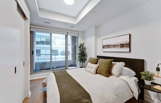Walk to Parliament from this high-end condo w/gym