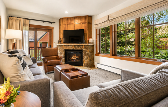 Bright, cozy living room with fireplace. Perfect for relaxing after a short walk back from the slopes.