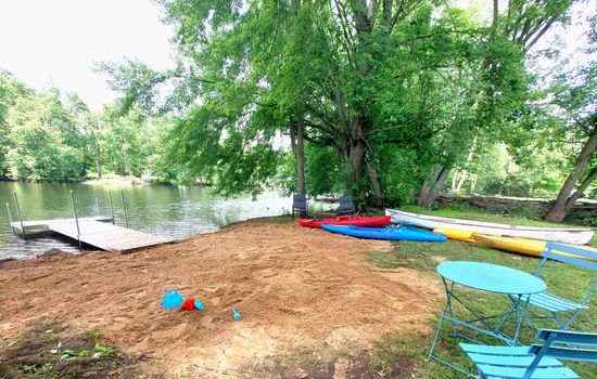 Our private beach with kayaks, canoe, paddleboards, and space to slow down. Unlike the busy, high-traffic lakes, the river offers a calmer place to paddle. Beach installed end of June until the first frost.