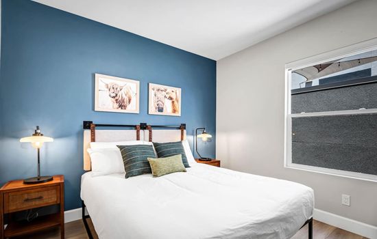 Your personal haven of relaxation—this queen-size bed awaits. ️