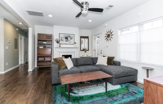 A versatile layout designed for easy conversation and cozy nights .