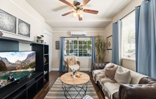 Where comfort meets charm, crafting cherished moments in a space designed for relaxation and connection, complete with a Smart TV for your entertainment.