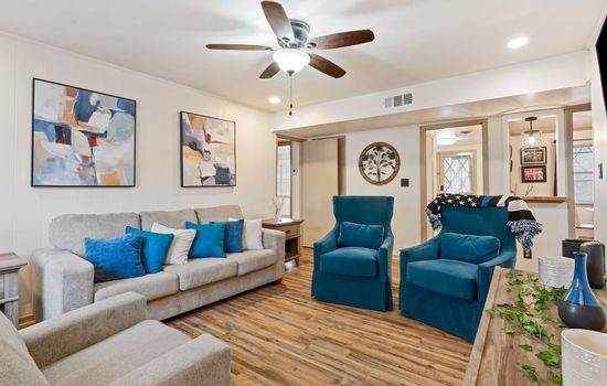 Unwind in the cozy living room with smart TV and comfortable seating after exploring Birmingham.