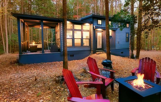 This cozy tiny home, "Delilah," perched atop Lookout Mountain, offers the perfect retreat surrounded by nature.