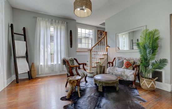 Beautiful sitting area with lots of character and natural light.