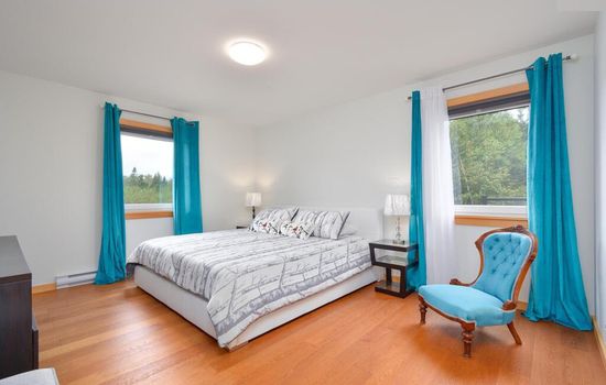Master suite with walk-in closet, vanity, bidet, soaking tub and walk-in shower (on main floor)