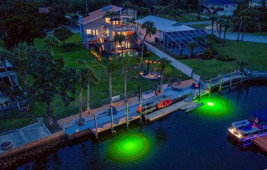Direct Gulf-access waterfront retreat with heated pool, 45’ dock, and underwater fishing lights