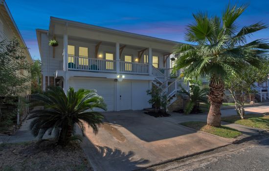 M Avenue Trio — book the entire historic triplex at 1703-1705 Avenue M in Galveston's Lost Bayou District. All three units, one big group, sleeps 19, an 8-minute walk to the beach.