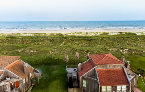 Take the path over the sand dune directly to the beach
