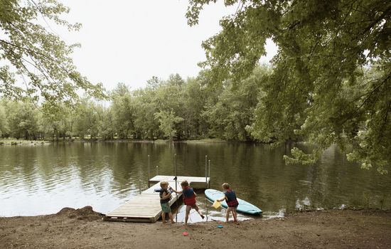 Private 10 ft dock with gradual shallow slope on a swimmable waterfront.