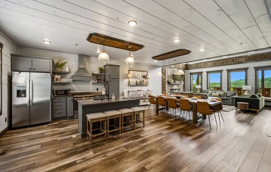 A large well-appointed kitchen with high-end appliances and wonderful views