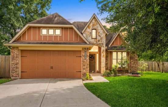 Beautiful exterior with charming curb appeal and a spacious driveway for easy parking.
