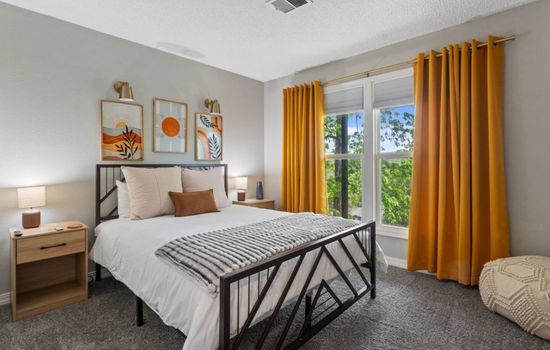 Master bedroom with queen size bed.