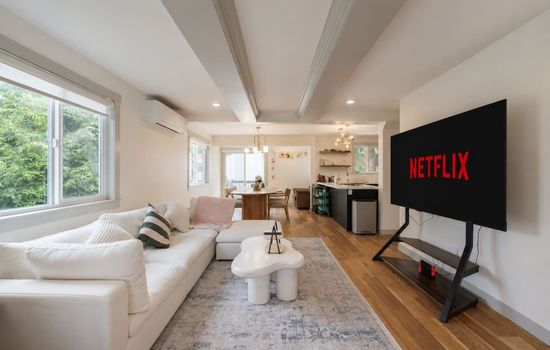 Open concept living space flowing seamlessly into the dining area and kitchen for easy gathering.