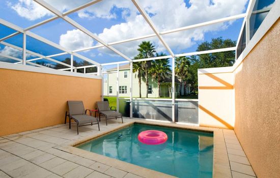 Private screened pool area with spacious deck space perfect for relaxing and entertaining.