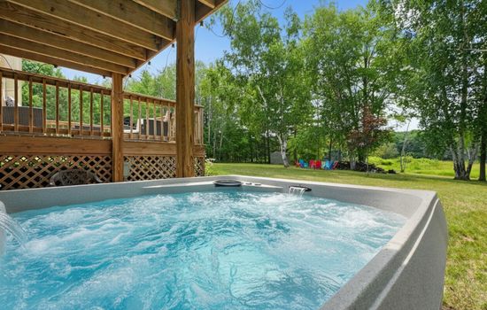 Hot Tub Retreat: Unwind in our bubbling hot tub surrounded by nature's tranquility!