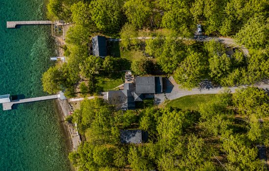 Aerial view of the wooded lakeside property
