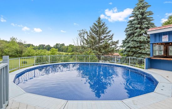 Above-ground pool beside the outdoor bar