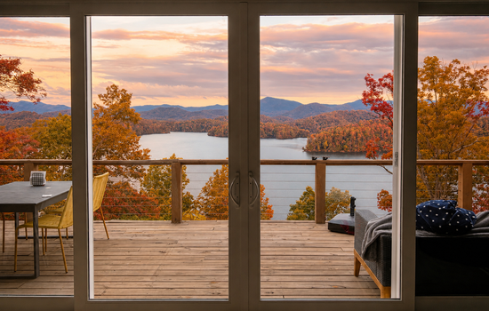The best seat in the house. ☕🏔️ Wake up to sweeping views of Lake Santeetlah and the Smoky Mountains from the comfort of Hidden Point House.