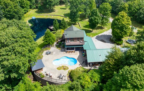 Aerial view of the home and pool