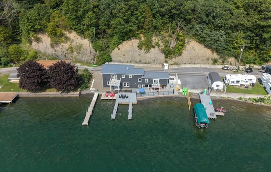Aerial view of the lakefront property and docks