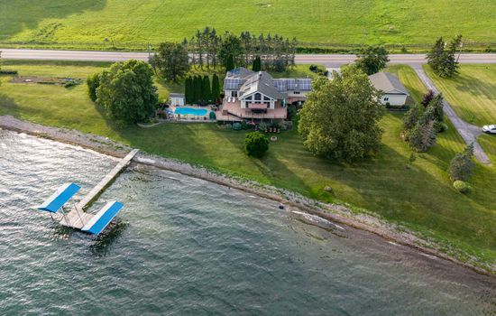 Aerial view of the house and shoreline