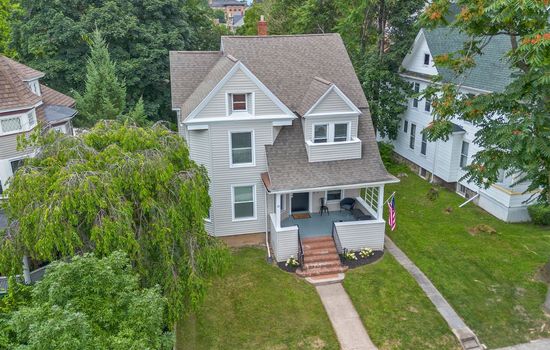 Aerial view of the home and backyard