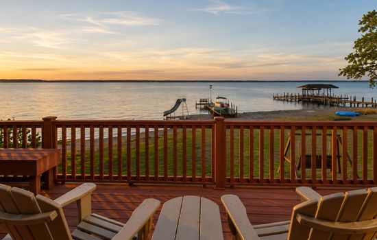 Sunset lake view from the spacious deck